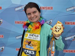 Jitka Kov s medajl po dobhu Disney Marathonu.