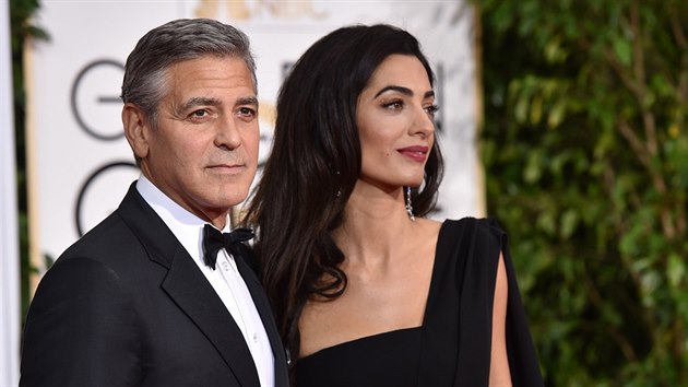 George Clooney a jeho manelka Amal na Zlatch glbech (Beverly Hills, 11. ledna 2015)