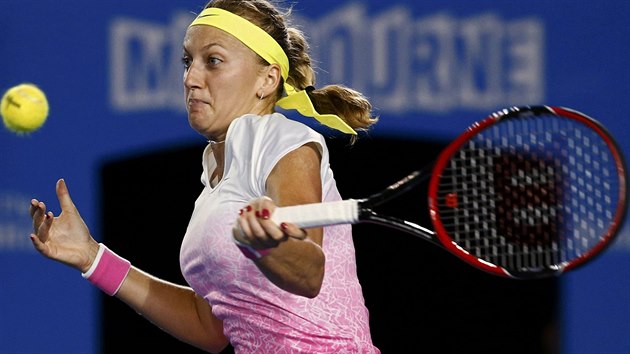 Petra Kvitova of the Czech Republic hits a return against Madison Keys of the U.S. during their women's singles third round match at the Australian Open 2015 tennis tournament in Melbourne