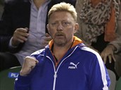 Boris Becker se raduje z vhry svho svence Novaka Djokovie na Australian...