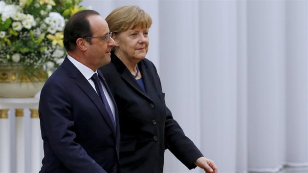 Franois Hollande a Angela Merkelov ped zahjenm summitu (11. nora)