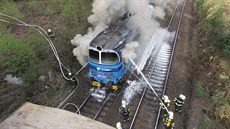 Poár lokomotivy na elezniní trati u Pohledu nedaleko Havlíkova Brodu. Po...