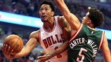 Chicagský Derrick Rose (vlevo) se snaží prosadit přes bránícícho Michaela... Chicagský Derrick Rose (vlevo) se snaží prosadit přes bránícícho Michaela...