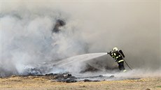 S poárem se prali také v nedaleké obci Zhoec, kde hoel stoh.