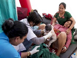 Maya Tamang, 20, gives birth to her daughter after an earthquake at...