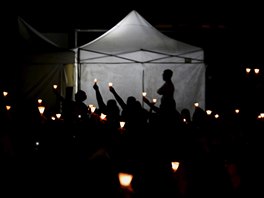People attend an annual candlelight vigil at Victoria Park in Hong Kong