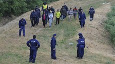 Ilegální imigranti nedaleko maďarského Szegédu (25. června 2015) Ilegální imigranti nedaleko maďarského Szegédu (25. června 2015)