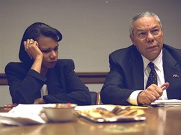 U.S. Secretary of State Colin Powell (R) and National Security Advisor...