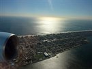 Rozednní nad newyorským ostrovem Long Islandem vyfotila z letadla Eva z...