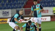 Slávista Radek Voltr (uprosted) se raduje ze svého prvního ligového gólu....