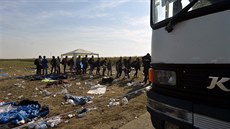 Uprchlíci nedaleko hranic Maďarska a Rakouska (30. srpna 2015) Uprchlíci nedaleko hranic Maďarska a Rakouska (30. srpna 2015)