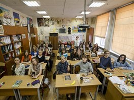 Students of the 10th form of the Gymnasium 1567 pose for a group portrait...