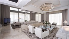 Obývací pokoj navrhli designéi v teplých odstínech smetanové a edohndé.