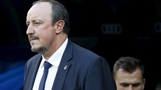 Rafael Benítez. trenér Realu Madrid, za ním Denis eryev.