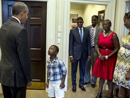tyletý Malik Hall, jeho strýc Maurice Owens v Bílém dom pracuje, se setkal...