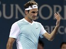 Roger Federer ve finlovm duelu s Milosem Raonicem.