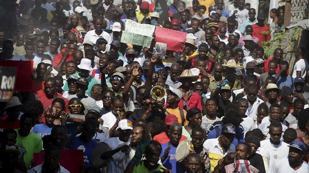 Protesters march during a demonstration against the electoral process in Port-au-Prince, Haiti