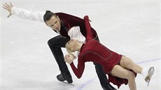 Sportovní pár Taťjana Volosožarová a Maxim Traňkov bruslí svou zlatou jízdu z... Sportovní pár Taťjana Volosožarová a Maxim Traňkov bruslí svou zlatou jízdu z...