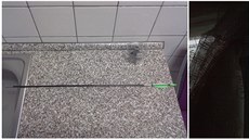 Šíp a poničená výplň okna po zásahu neznámého střelce. Šíp a poničená výplň okna po zásahu neznámého střelce.