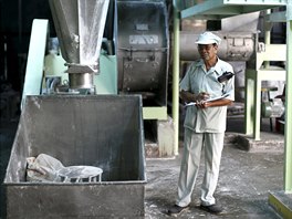 Thongdee Saenghow, a 62-year-old production supervisor, works at a rice...