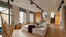 Obývací pokoj poskytuje rozmanité druhy relaxaního posezení: sedací soupravu v...