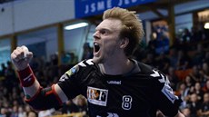 Lovosický házenkář Jiří Motl se raduje z gólu. Lovosický házenkář Jiří Motl se raduje z gólu.