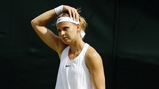 Lucie afáová bhem prvního kola Wimbledonu.