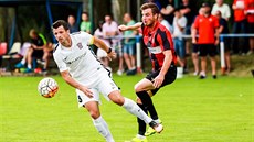Tadas Kijanskas v dresu Brna (vlevo) v utkání proti Opavě. Tadas Kijanskas v dresu Brna (vlevo) v utkání proti Opavě.