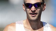 Bronzový skifa Ondej Synek v cíli olympijského závodu v Riu. (13. srpna 2016)