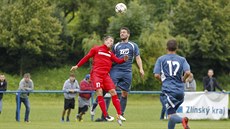 Momentka z duelu druhého kola domácího poháru mezi Slavičínem a Brnem (červená) Momentka z duelu druhého kola domácího poháru mezi Slavičínem a Brnem (červená)