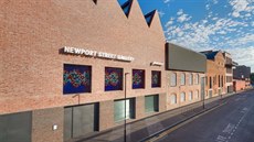 S přidáním dvou nových budov přesahuje nyní galerie polovinu délky ulice. S přidáním dvou nových budov přesahuje nyní galerie polovinu délky ulice.