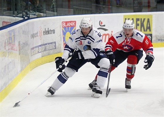 Momentka z utkání 1. hokejové ligy Tebíe (ervená) s Kladnem.
