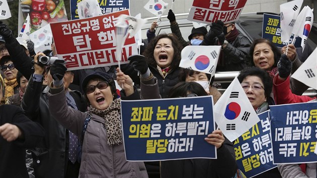 Lid v ulicch Soulu slav sesazen prezidentky Pak Kun-hje (9. prosince 2016).