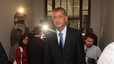 Roman Janouek ped jednáním u Vrchního soudu v Praze (16. záí 2014).