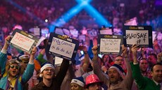 Fanoušci šipek v londýnském Alexandra Palace během mistrovství světa. Fanoušci šipek v londýnském Alexandra Palace během mistrovství světa.