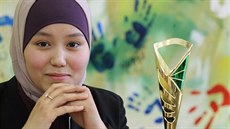 Studentka cukrařiny a vítězka soutěže Ajpkaljeva Botakoz. Studentka cukrařiny a vítězka soutěže Ajpkaljeva Botakoz.