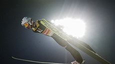 Polský skokan na lyžích Kamil Stoch na středním můstku v Pchjongčchangu. Polský skokan na lyžích Kamil Stoch na středním můstku v Pchjongčchangu.