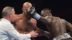 Deontay Wilder zasypává tvrdými ranami Geralda Washingtona, duel o titul WBC... Deontay Wilder zasypává tvrdými ranami Geralda Washingtona, duel o titul WBC...