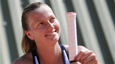 S ÚSMVEM. Petra Kvitová pi tréninku ped odletem na Roland Garros v Paíi.