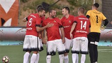Čeští reprezentanti v malém fotbale se radují z gólu. Čeští reprezentanti v malém fotbale se radují z gólu.