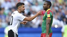 Německý reprezentant Kerem Demirbay (vlevo) se raduje z gólu, probíhá kolem... Německý reprezentant Kerem Demirbay (vlevo) se raduje z gólu, probíhá kolem...