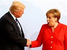 Momentka z pivtn. Nmeck kanclka Angela Merkelov a americk prezident...