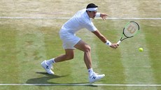 Kanaan Milos Raonic bhem tetího kola Wimlbedonu.