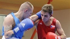 Český boxer Erik Agatelian bojuje s Mateuszem Polským z Polska. Český boxer Erik Agatelian bojuje s Mateuszem Polským z Polska.
