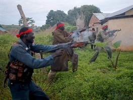 SPLA-IO (SPLA-In Opposition) rebels fire weapons during an assault...