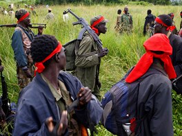 SPLA-IO (SPLA-In Opposition) rebels carry guns in Yondu, the day before an...
