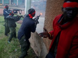 SPLA-IO (SPLA-In Opposition) rebels fire weapons during an assault...