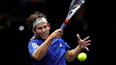 Rakouský tenista Dominic Thiem v duelu Laver Cupu s Johhem Isnerem z USA. Rakouský tenista Dominic Thiem v duelu Laver Cupu s Johhem Isnerem z USA.