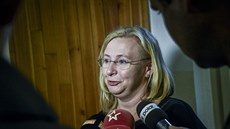 Učitelka Vanda Fabianová u krajského soudu v Ostravě, který potvrdil rozsudek... Učitelka Vanda Fabianová u krajského soudu v Ostravě, který potvrdil rozsudek...
