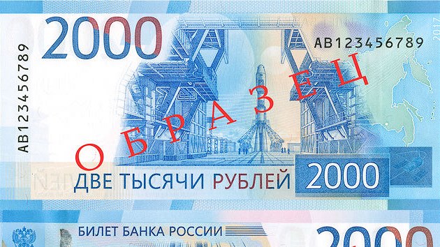 Nov dvoutiscov bankovka m na lci kosmodrom Vostonyj, na rubu je most ve Vladivostoku